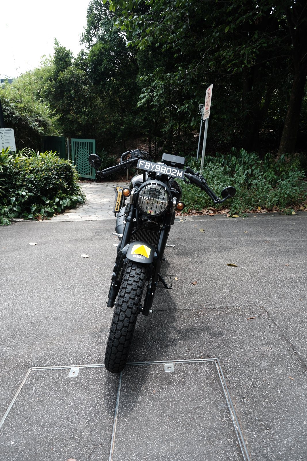 Head-on with clubman bars and bar-end mirrors